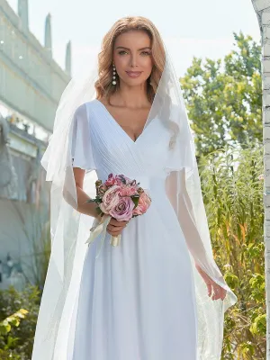 Maxi robe de mariée minimaliste en mousseline de soie avec ceinture en satin