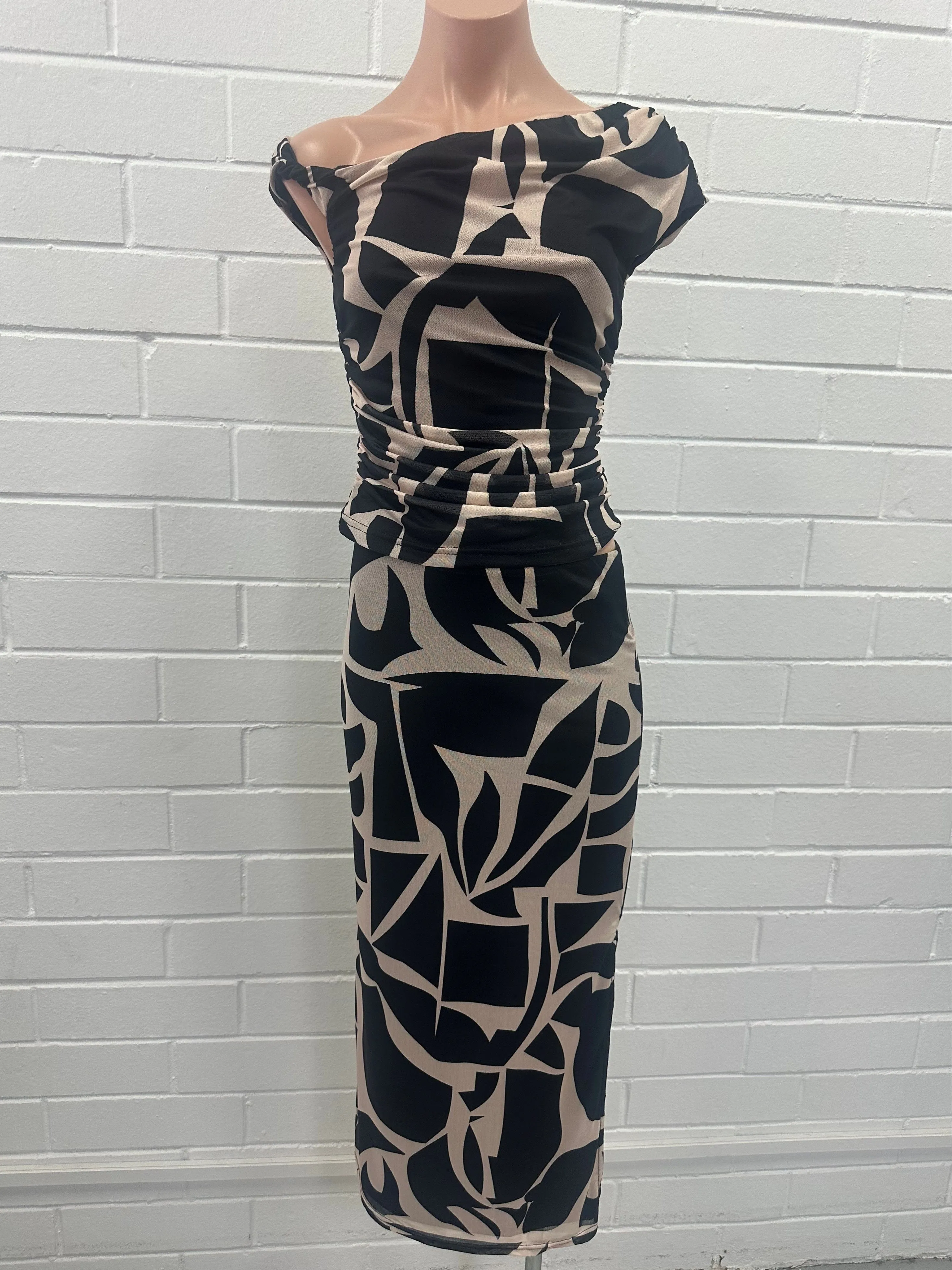 OP00106T ASYMMETRICAL NECKLINE TOP