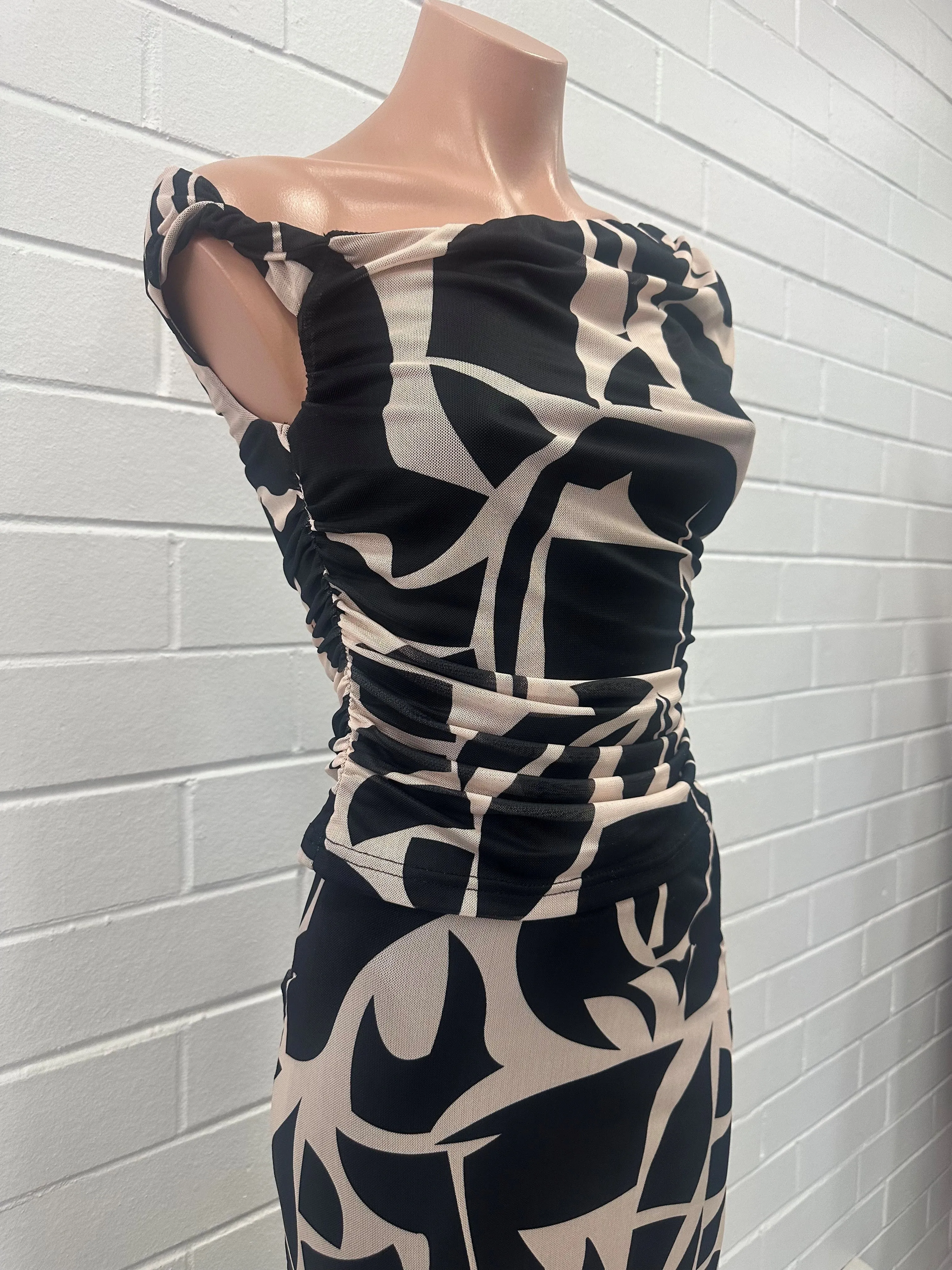 OP00106T ASYMMETRICAL NECKLINE TOP