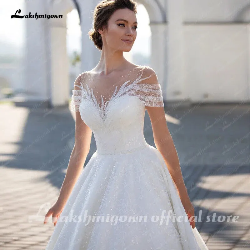 Roycebridal Sparkling Off-The-Shoulder Wedding Dress Elegant Glitter Lace A-Line Bridal Gown with Illusion Pleats Short Sleeves