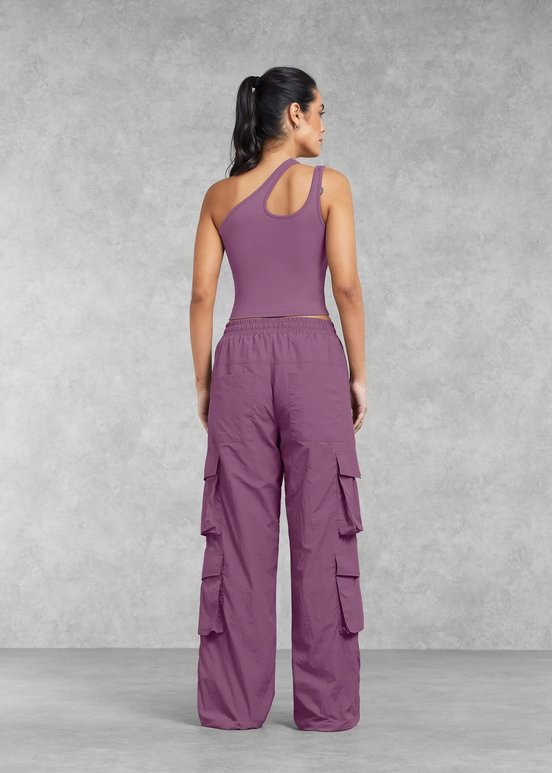 THE GIVING MOVEMENT SOFTSKIN ASYMMETRIC VEST