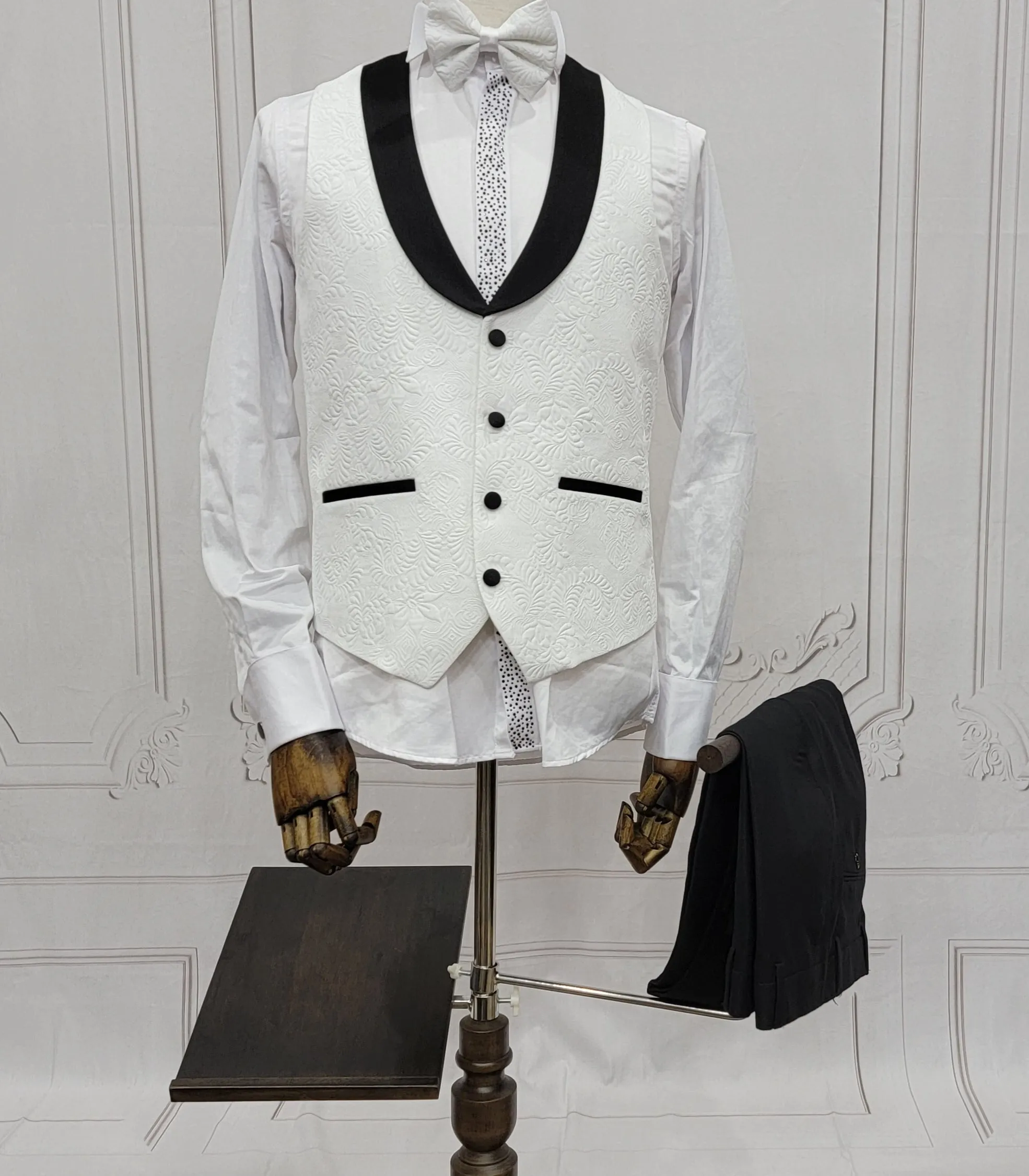 Three Pieces Tuxedo Suit with Contrasting Black tapered Lapel, matching bow tie and Black Pants.